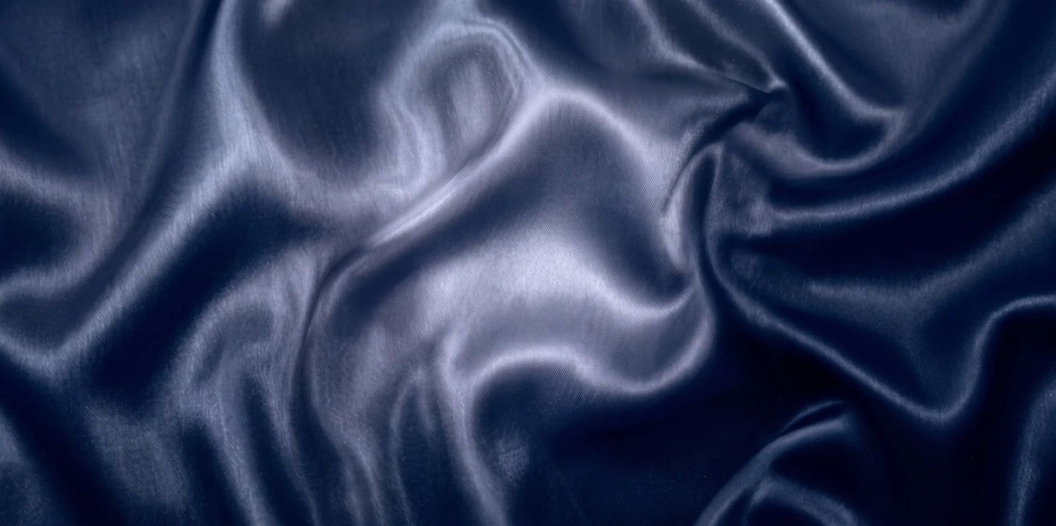 Tissu bleu marine 22 mommes distordu.