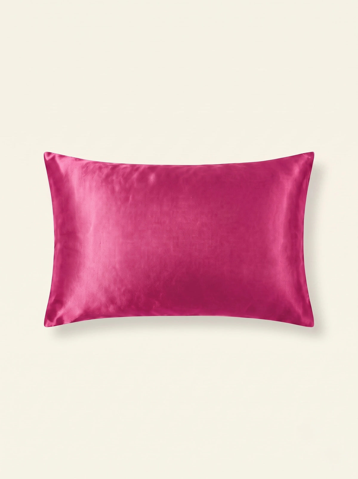 Taie d'oreiller en soie 25 mommes ivoire sur fond fuchsia.