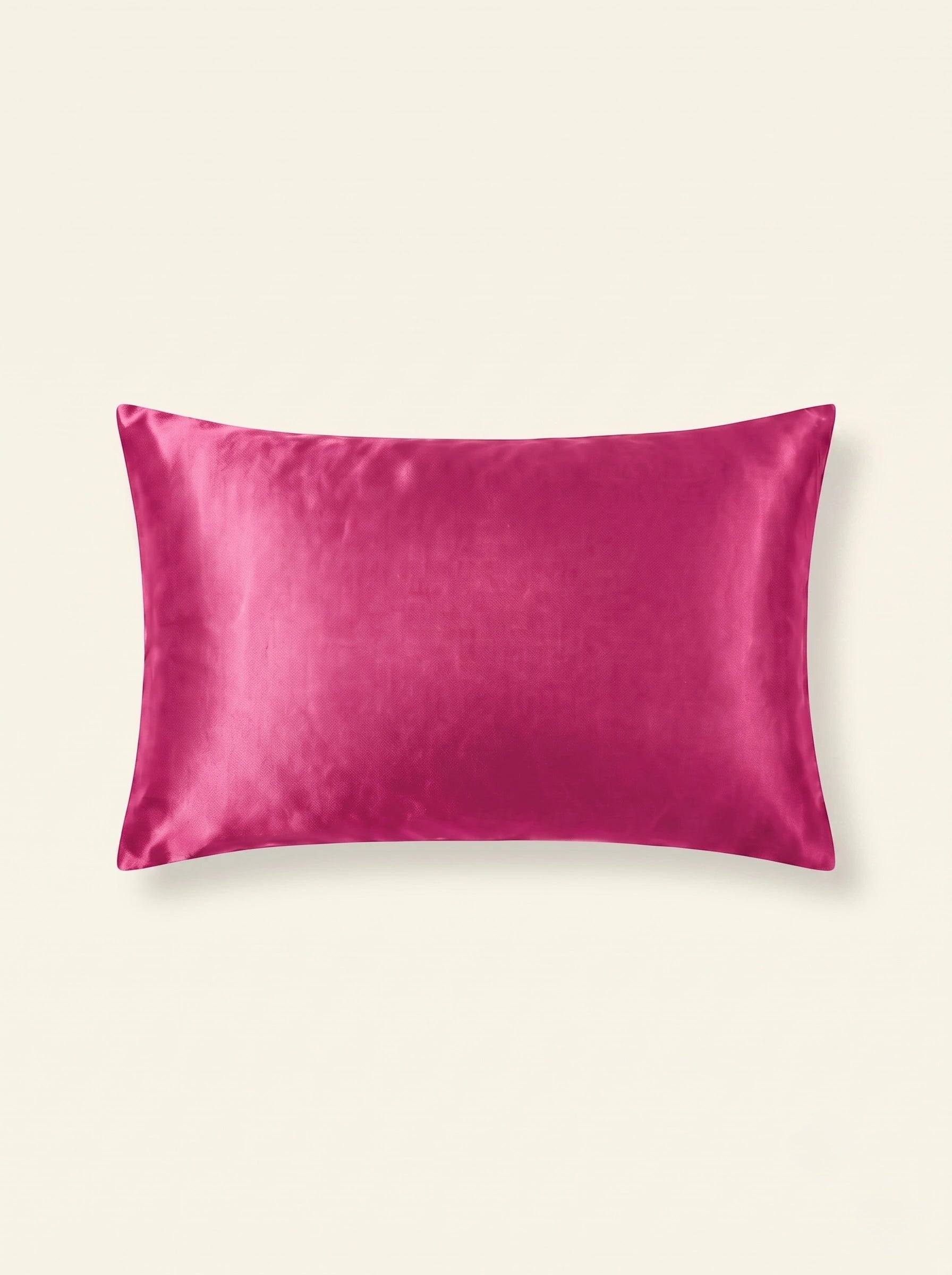 Taie d'oreiller en soie 25 mommes ivoire sur fond fuchsia.